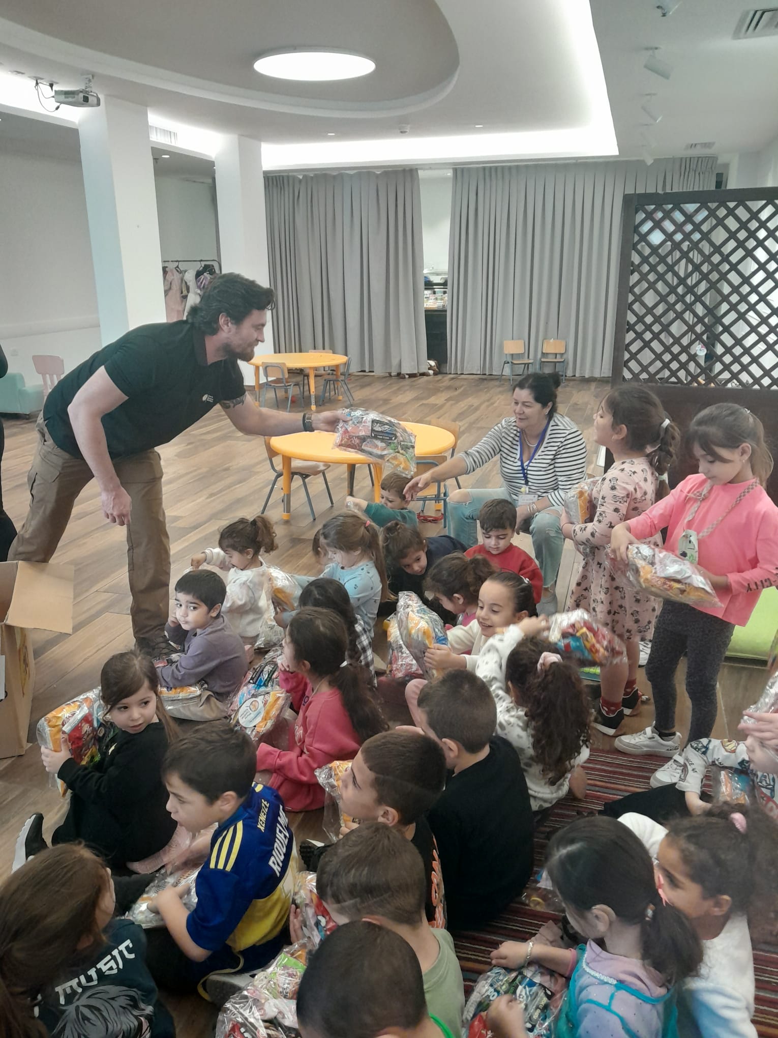 Handing supplies to children in Israel