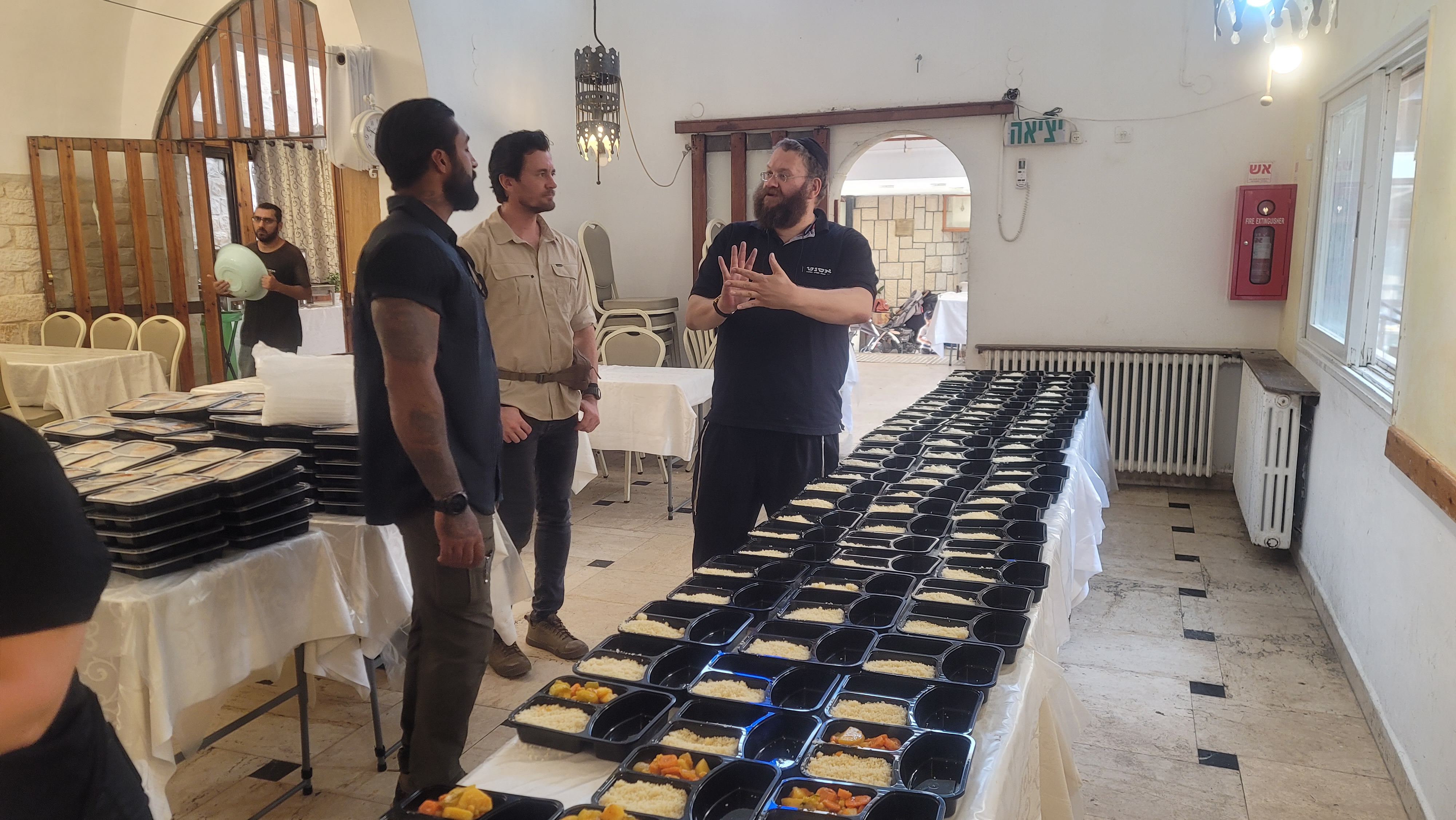 Hundreds of food trays prepared for distribution in Israel